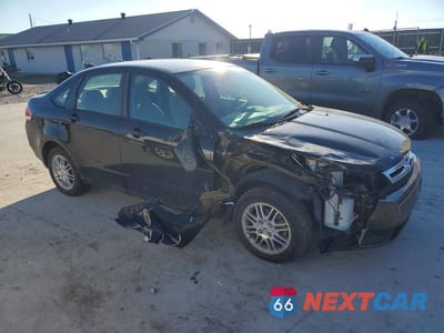 Czwarte zdjęcie samochodu z boku: 2010 FORD FOCUS SE VIN:1FAHP3FN3AW144259 - miniatura