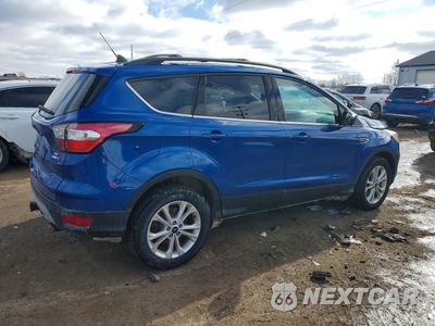 Trzecie zdjęcie samochodu z tyłu: 2018 FORD ESCAPE SE VIN:1FMCU9GD9JUB52444 - miniatura