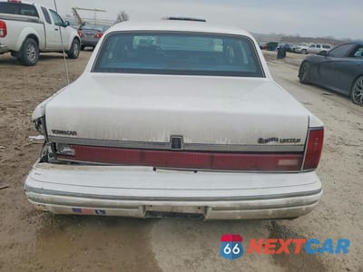 Zdjęcie 6 z 11 samochodu: 1994 LINCOLN TOWN CAR EXECUTIVE VIN:1LNLM81W6RY704376 - miniatura