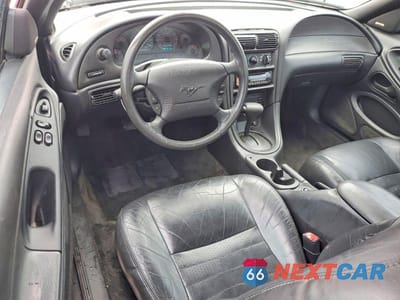 Zdjęcie 8 z 13 samochodu: 2000 FORD MUSTANG GT VIN:1FAFP42X1YF274040 - miniatura