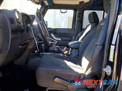 Zdjęcie 7 z 11 samochodu: 2015 JEEP WRANGLER UNLIMITED RUBICON VIN:1C4BJWFG9FL612282 - miniatura