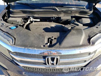 Zdjęcie 12 z 13 samochodu: 2016 HONDA PILOT EXL VIN:5FNYF5H89GB008490 - miniatura
