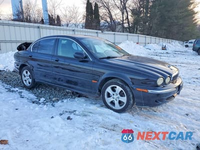 Czwarte zdjęcie samochodu z boku: 2002 JAGUAR X-TYPE 3.0 VIN:SAJEB51C12WC75130 - miniatura