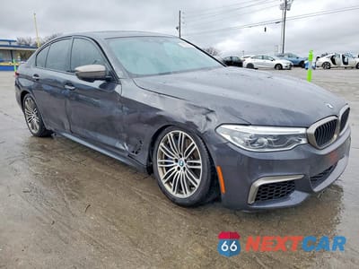 Czwarte zdjęcie samochodu z boku: 2018 BMW M550XI VIN:WBAJB9C51JB035479 - miniatura