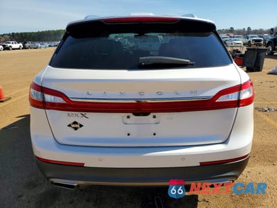 Zdjęcie 6 z 12 samochodu: 2018 LINCOLN MKX RESERVE VIN:2LMPJ6LR5JBL25574 - miniatura