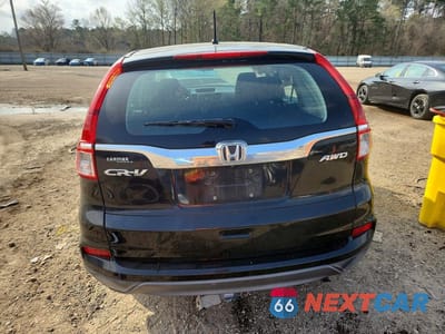 Zdjęcie 6 z 12 samochodu: 2016 HONDA CR-V LX VIN:5J6RM4H35GL049828 - miniatura