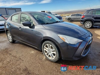 Czwarte zdjęcie samochodu z boku: 2016 SCION IA BASE VIN:3MYDLBZV2GY140314 - miniatura