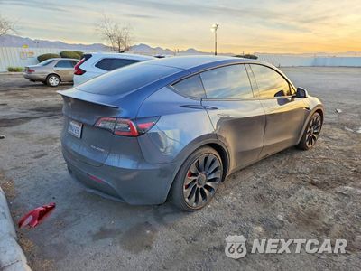 Trzecie zdjęcie samochodu z tyłu: 2022 TESLA MODEL Y VIN:7SAYGDEF0NF404883 - miniatura