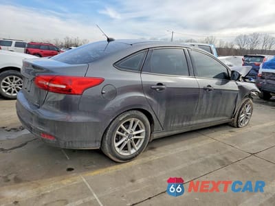 Trzecie zdjęcie samochodu z tyłu: 2016 FORD FOCUS SE VIN:1FADP3F2XGL359166 - miniatura