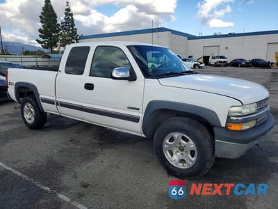 Czwarte zdjęcie samochodu z boku: 2001 CHEVROLET SILVERADO K1500 VIN:1GCEK19T41E129463 - miniatura