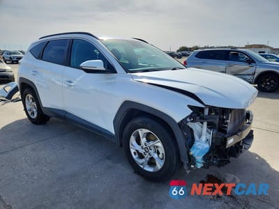 Czwarte zdjęcie samochodu z boku: 2022 HYUNDAI TUCSON SEL VIN:5NMJB3AE5NH037739 - miniatura