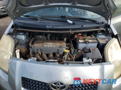 Zdjęcie 11 z 12 samochodu: 2008 TOYOTA YARIS VIN:JTDJT923185201430 - miniatura