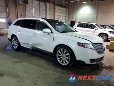 Czwarte zdjęcie samochodu z boku: 2012 LINCOLN MKT VIN:2LMHJ5AT5CBL50233 - miniatura