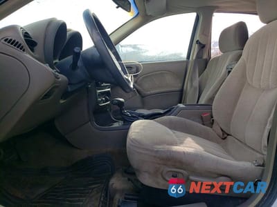 Zdjęcie 7 z 12 samochodu: 1999 PONTIAC GRAND AM SE VIN:1G2NE52E2XC508402 - miniatura