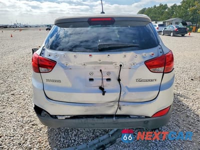 Zdjęcie 6 z 13 samochodu: 2010 HYUNDAI TUCSON GLS VIN:KM8JT3AC8AU010710 - miniatura