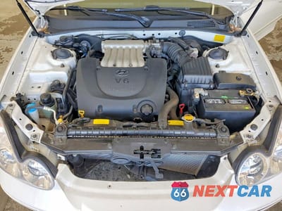 Zdjęcie 11 z 11 samochodu: 2002 HYUNDAI SONATA GLS VIN:KMHWF35H72A685874 - miniatura