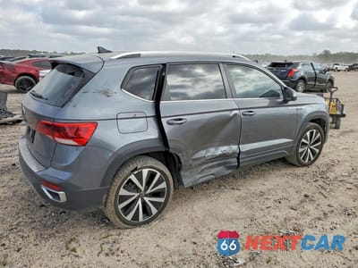 Trzecie zdjęcie samochodu z tyłu: 2022 VOLKSWAGEN TAOS SE VIN:3VVTX7B25NM071359 - miniatura