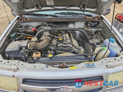 Zdjęcie 12 z 12 samochodu: 2002 CHEVROLET TRACKER VIN:2CNBJ13C326923645 - miniatura