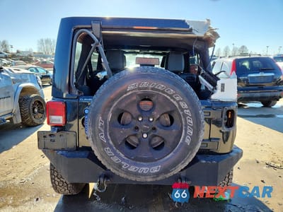 Zdjęcie 6 z 12 samochodu: 2015 JEEP WRANGLER UNLIMITED SAHARA VIN:1C4BJWEG0FL754330 - miniatura