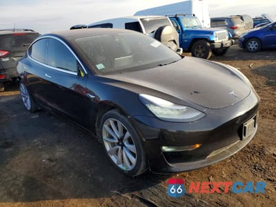 Czwarte zdjęcie samochodu z boku: 2018 TESLA MODEL 3 VIN:5YJ3E1EB9JF090475 - miniatura