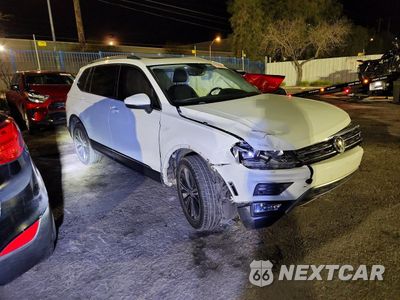 Czwarte zdjęcie samochodu z boku: 2019 VOLKSWAGEN TIGUAN SE VIN:3VV3B7AX3KM056088 - miniatura
