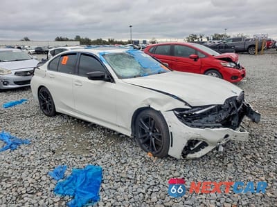 Czwarte zdjęcie samochodu z boku: 2021 BMW 330E VIN:3MW5P7J06M8C02746 - miniatura