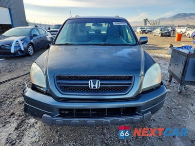 Piąte zdjęcie samochodu w środku: 2005 HONDA PILOT EXL VIN:5FNYF18505B016487 - miniatura