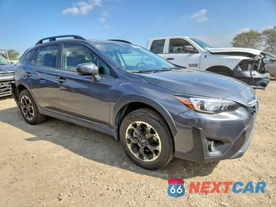 Czwarte zdjęcie samochodu z boku: 2021 SUBARU CROSSTREK PREMIUM VIN:JF2GTAEC1M8336022 - miniatura