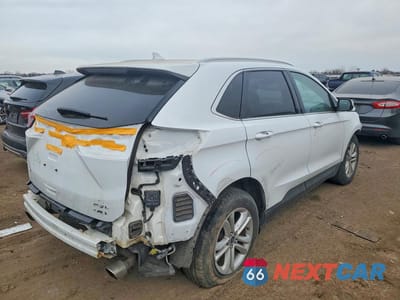Trzecie zdjęcie samochodu z tyłu: 2019 FORD EDGE SEL VIN:2FMPK4J90KBB17734 - miniatura