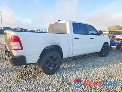Trzecie zdjęcie samochodu z tyłu: 2020 RAM 1500 TRADESMAN VIN:1C6SRFGT9LN240860 - miniatura