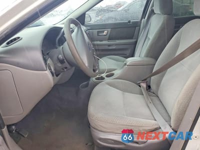 Zdjęcie 7 z 13 samochodu: 2000 FORD TAURUS LX VIN:1FAFP5221YA243068 - miniatura