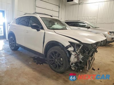 Czwarte zdjęcie samochodu z boku: 2024 MAZDA CX-5 CARBON TURBO VIN:JM3KFBAY9R0512271 - miniatura