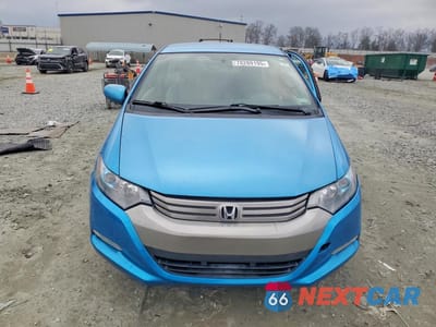 Piąte zdjęcie samochodu w środku: 2010 HONDA INSIGHT LX VIN:JHMZE2H5XAS000192 - miniatura