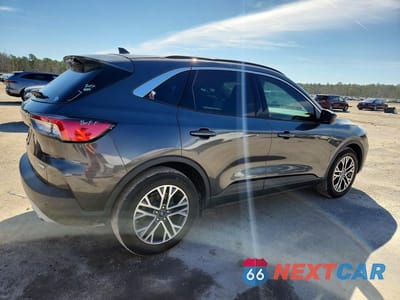 Trzecie zdjęcie samochodu z tyłu: 2020 FORD ESCAPE SEL VIN:1FMCU0H62LUA67198 - miniatura