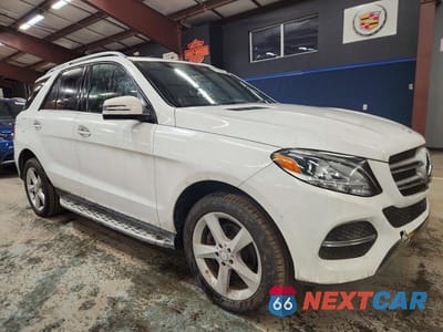 Czwarte zdjęcie samochodu z boku: 2016 MERCEDES-BENZ GLE 300D 4MATIC VIN:4JGDA0EB2GA725978 - miniatura