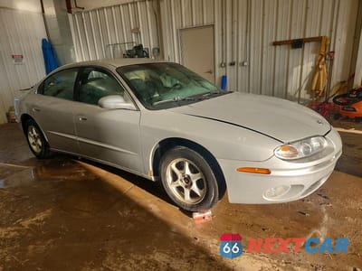 Czwarte zdjęcie samochodu z boku: 2001 OLDSMOBILE AURORA VIN:1G3GR64H014205500 - miniatura