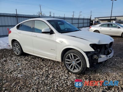 Czwarte zdjęcie samochodu z boku: 2015 BMW X4 XDRIVE28I VIN:5UXXW3C54F0F89022 - miniatura