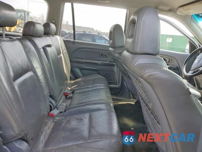 Zdjęcie 11 z 13 samochodu: 2003 HONDA PILOT VIN:2HKYF18523H601151 - miniatura