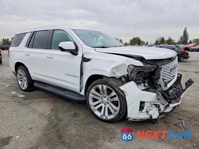 Czwarte zdjęcie samochodu z boku: 2021 GMC YUKON SLE VIN:1GKS1AED8MR240846 - miniatura