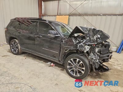 Czwarte zdjęcie samochodu z boku: 2023 JEEP GRAND CHEROKEE L OVERLAND VIN:1C4RJKDT4P8861164 - miniatura
