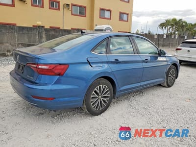 Trzecie zdjęcie samochodu z tyłu: 2021 VOLKSWAGEN JETTA S VIN:3VWC57BUXMM102087 - miniatura