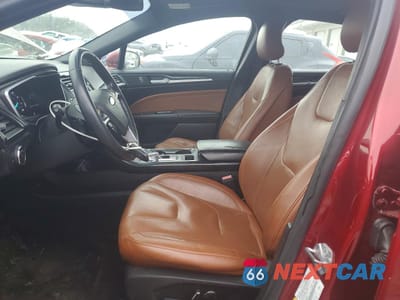Zdjęcie 7 z 12 samochodu: 2019 FORD FUSION TITANIUM VIN:3FA6P0D92KR153180 - miniatura