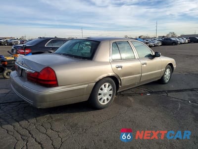 Trzecie zdjęcie samochodu z tyłu: 2003 MERCURY GRAND MARQUIS LS VIN:2MEFM75W53X710049 - miniatura