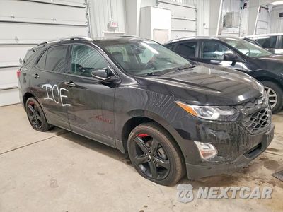 Czwarte zdjęcie samochodu z boku: 2021 CHEVROLET EQUINOX PREMIER VIN:2GNAXXEVXM6164079 - miniatura