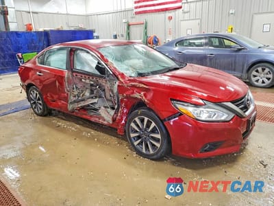 Czwarte zdjęcie samochodu z boku: 2017 NISSAN ALTIMA 2.5 VIN:1N4AL3AP9HC247428 - miniatura