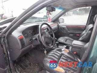 Zdjęcie 7 z 12 samochodu: 1999 JEEP GRAND CHEROKEE LIMITED VIN:1J4GW68N3XC639363 - miniatura