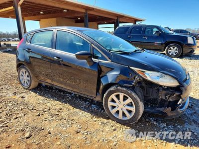 Czwarte zdjęcie samochodu z boku: 2011 FORD FIESTA SE VIN:3FADP4EJ7BM161764 - miniatura