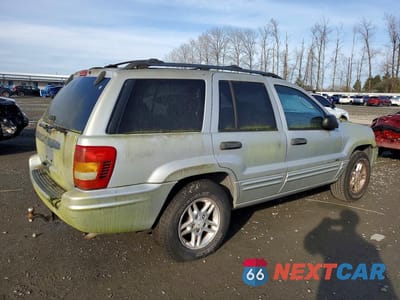 Trzecie zdjęcie samochodu z tyłu: 2004 JEEP GRAND CHEROKEE LAREDO VIN:1J4GW48S04C343903 - miniatura