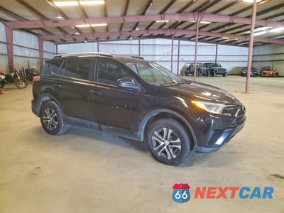 Czwarte zdjęcie samochodu z boku: 2018 TOYOTA RAV4 LE VIN:2T3ZFREV4JW518303 - miniatura