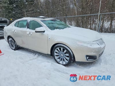 Czwarte zdjęcie samochodu z boku: 2009 LINCOLN TOWNHOUSE MKS VIN:1LNHM94R89G631745 - miniatura